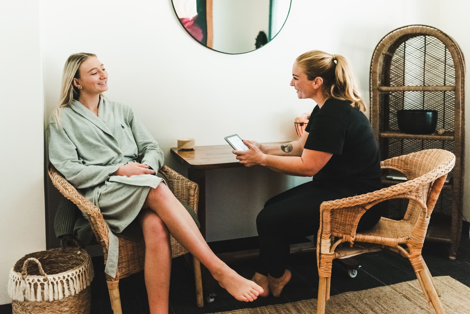 Jodie consulting with a client before a personalised session