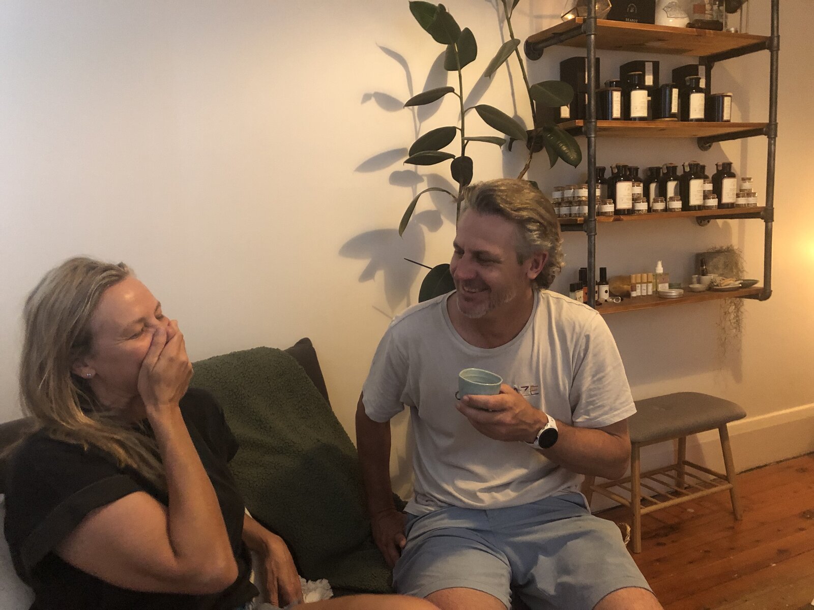 Jodie sharing a candid moment with a client in the Mountain Wellness Co studio